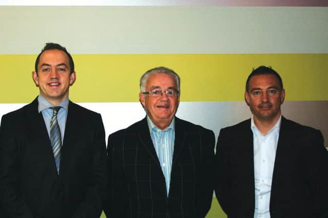 Mat (left) and Dan (right) with their father Jim Brown