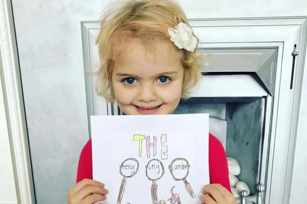 Four-year-old Evie who has written a book entitled Teeny Tiny Plumber to raise funds for Derian House Children's Hospice.