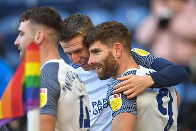 Ched Evans is congratulated by Emil Riis and Ben Whiteman after scoring for PNE against Fulham