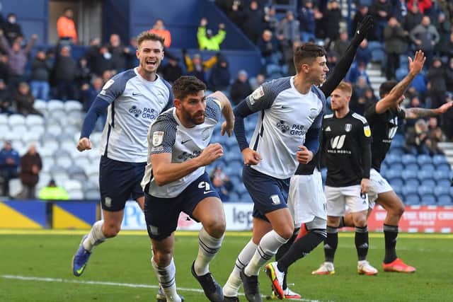 Ched Evans turns to celebrate after scoring PNE's equaliser against Fulham at Deepdale