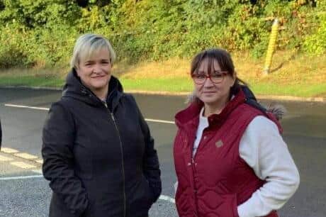 Alyson Wilkinson and Michelle Le Marinel opposite the demolished lamppost on Clayton Brook Road