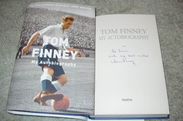 The autographed book Dave received from Sir Tom