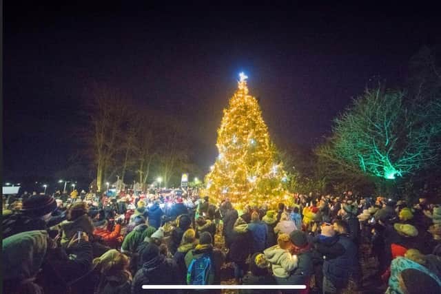 The squally conditions did not prevent villagers from turning out for the big switch-on in Clyaton-le-Woods (image courtesy of Boyd Harris)