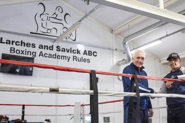 Michael Patel, right, is pictured with jimmy Moon at Larches and Savick ABC Boxing Academy