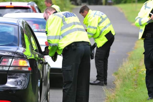 Police will be manning checkpoints for the next month testing drivers for drink or drugs.