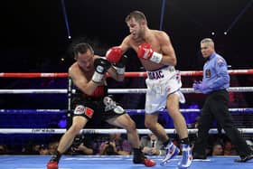 Isaac Lowe, right, on his way to victory over Duarn Vue during a featherweight fight at MGM Grand Garden Arena, in Las Vegas,