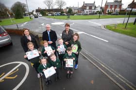 Fylde MP Mark Menzies with Ribby with Wrea school pupils and staff at the blackspot outside the school