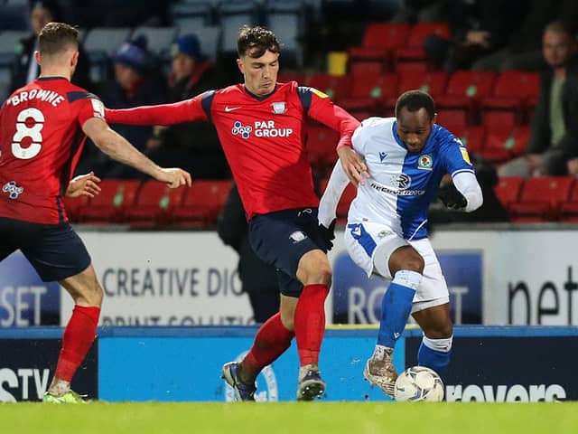 Blackburn Rovers’ Ryan Nyambe under pressure from North End’s Josh Earl