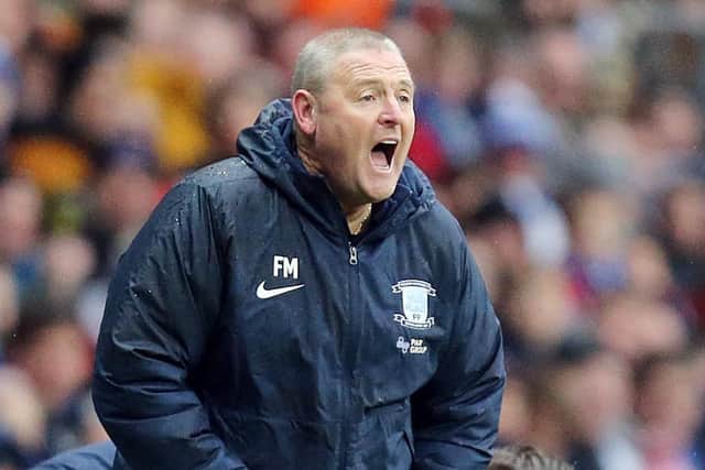Frankie McAvoy shouts instructions from the touchline at Ewood Park