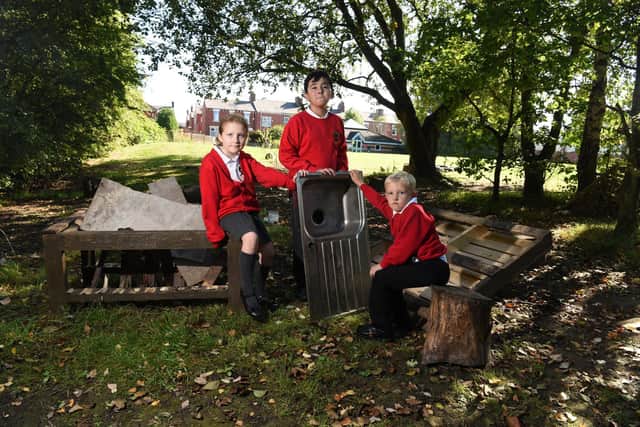 Pupils at Roebuck Primary School in their destroyed outdoor classroom back in September.
