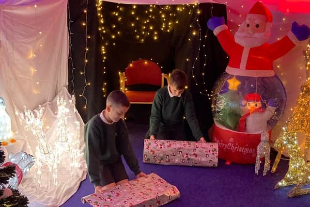Pupils at Ingol Community Primary School are wrapping the donated toys and helping decide who gets what!