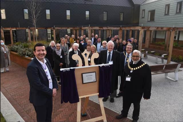 CGA chief executive Rob Wakefield and Preston Mayor Coun Javed Iqbal unveil a plaque to open The Courtyards.