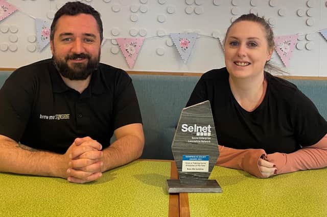 Joseph Gardiner, volunteer lead at Galloway’s, and Claire Lloyd, cafe manager, with the award.
