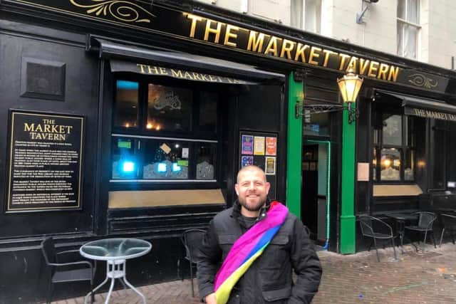 Paul outside the Tavern.
