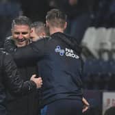 Manager Ryan Lowe is congratulated on his first win in charge