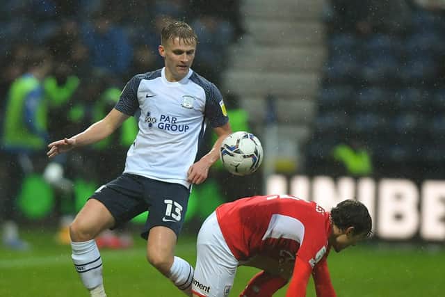 Preston North End's Ali McCann tackles Barnsley midfielder Callum Styles