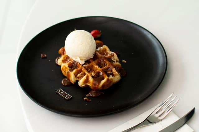 The restaurant is known for its indulgent desserts, such as sweet waffles and pancakes