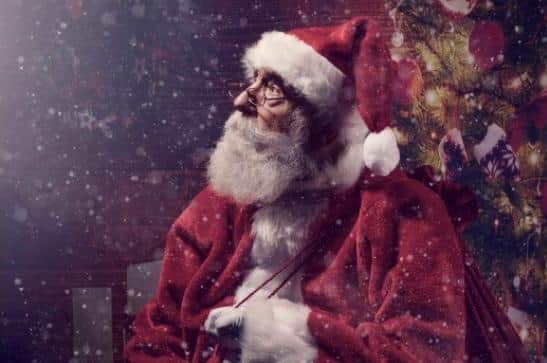 Harry has been collecting for Children in Need while playing Santa Claus (Image: Brian Sandham)..