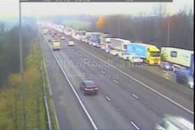 All northbound traffic was temporarily held after a crash involving two cars on the northbound M6 between junctions 26 (M58, Orrell Interchange) and 27 (Standish, Parbold) at around 8am