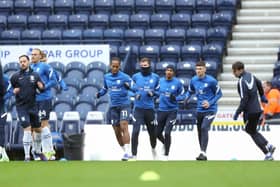 Preston North End players warm-up before a recent game