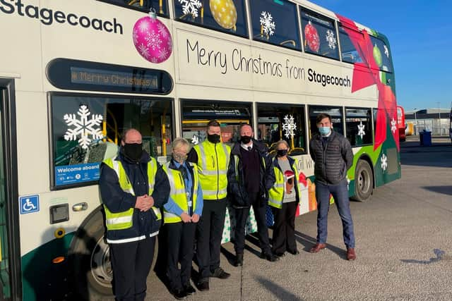 County Coun Charlie Edwards with Stagecoach staff in Morecambe