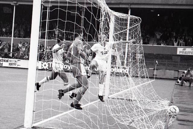 Mark Patterson jumps for joy in the net after scoring PNE's winner against Blackpool at Deepdale in September 1988