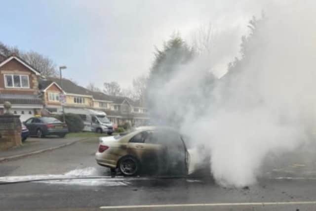 Minutes after Maggie and her husband were flagged down by a dog walker, their Mercedes was consumed by fire and shrouded in thick smoke. Pic: Maggie Worsfold Booth
