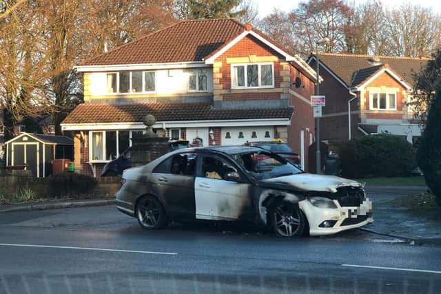 The Leyland fire crew were called to the scene to hose the Mercedes down after it exploded into flames in Leyland Lane on Saturday afternoon (December 18). Pic: Steven Smith