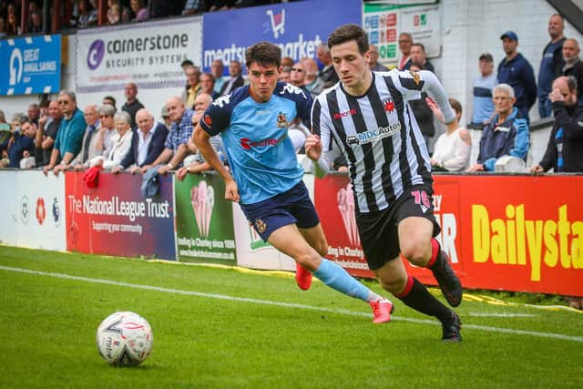 Chorley's Adam Blakeman on the ball against Southport, who have gone from bottom of the league to play-off contenders (photo:Stefan Willoughby)
