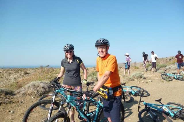 Ian pictured on a cycling holiday in Greece with his daughter Amy