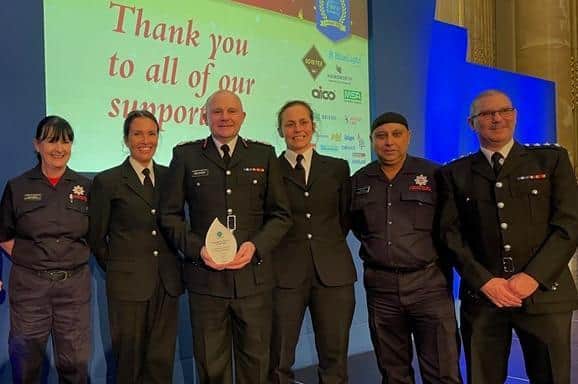 Lancashire Fire and Rescue staff  collecting the award in London. L-R: Gerry Hellier, Kelly Wood, Justin Johnston, Sarah Holden, Faz Patel and Mark Warwick.