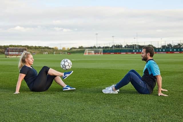 Cook showing off her skills with Man United star Juan Mata