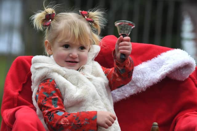 Matilda ringing the Christmas bell