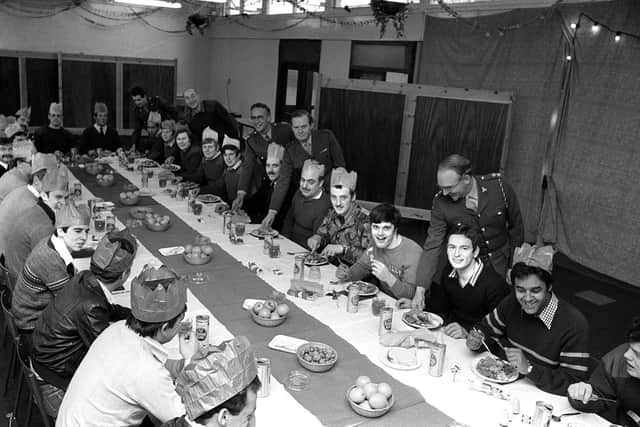 Firefighters enjoy a Christmas lunch at Fulwood Barracks in 1977