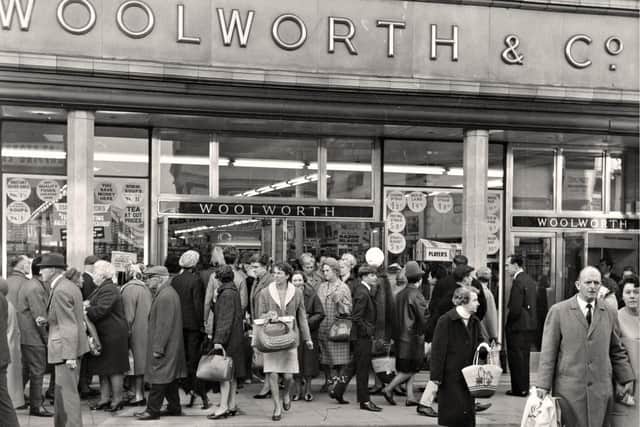 Christmas and shoppers flock to  Woolworths, in Fishergate, Preston, in 1963