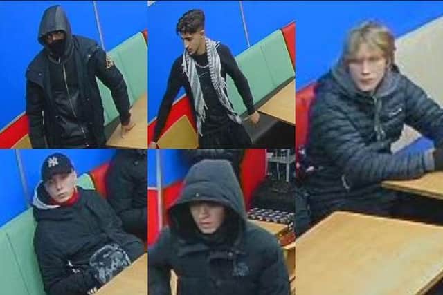 Do you recognise these men? Police want to speak to them after a man was assaulted in Blackburn town centre (Credit: Lancashire Police)
