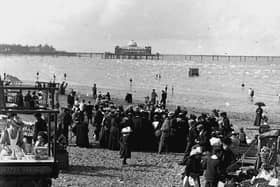Morecambe sands with the West End Pier in the background in 1900. Local traders make the most of the crowds of visitors enjoying some of the town's growing attractions