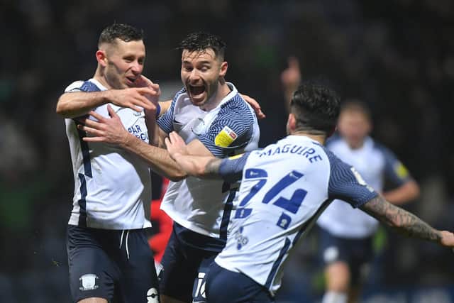 Alan Browne celebrates with Andrew Hughes and Sean Maguire after scoring for PNE against Barnsley