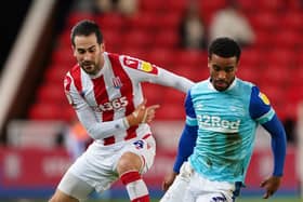 Mario Vrancic tracks Derby County’s Nathan Byrne during the Championship match at the bet365 Stadium last Thursday