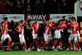 Morecambe celebrate Toumani Diagouraga's late winner