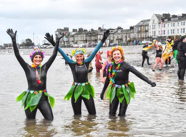 'Serious swimmers' took to the sea in wetsuits, some braved it in swimwear. Photo credit: Keith Douglas Photography