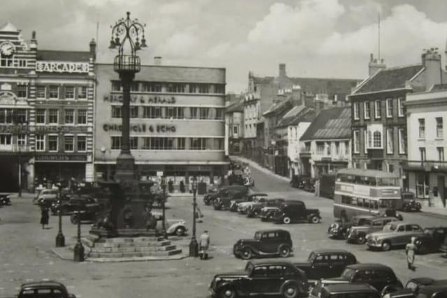 The Market Square once upon a time had no Grosvenor Centre and was filled with cars.