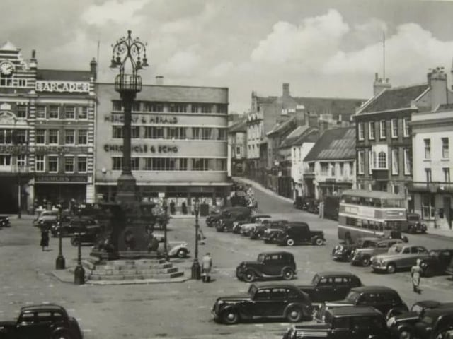 The Market Square once upon a time had no Grosvenor Centre and was filled with cars.