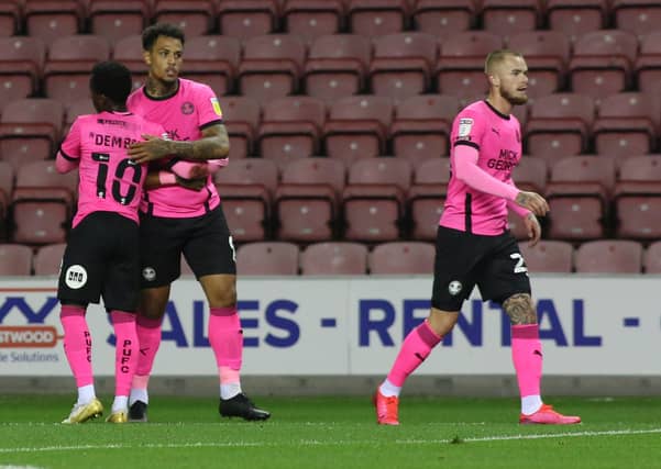 Jonson Clarke-Harris of Peterborough United celebrates the match-winning goal at Wigan. Photo: Joe Dent/theposh.com.
