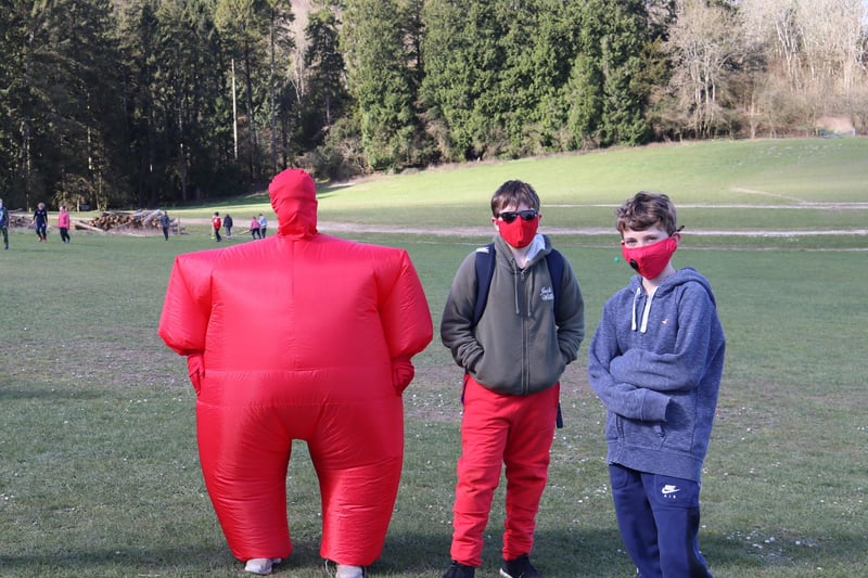These students wore not only red clothing but red masks to raise money.