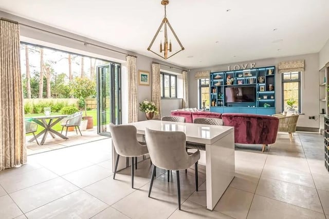 At the heart of this home is a contemporary open plan kitchen/dining/family room with bi-fold doors leading to the rear terrace. Picture: Jackson-Stops Lindfield.