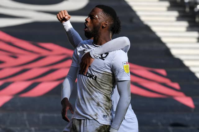 Mo Eisa celebrates scoring his ninth goal of the season