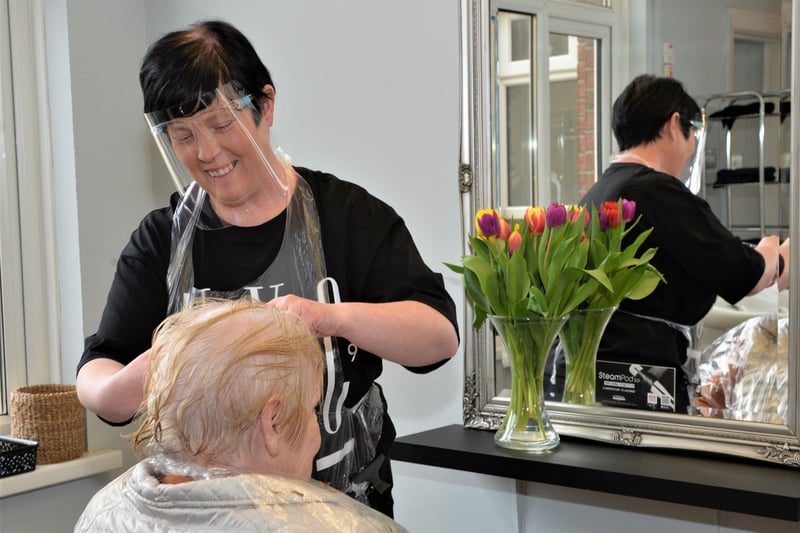 Lorraine Young owner of Rio Hair and Beauty salon is glad to be back at work. INLT 17-002-PSB COVID