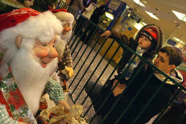 The wonder of Christmas...two-year-old Alfie Brahney from Morecambe dmires the moving elves display outside Santa's grotto in the Arndale Centre. This picture was taken in 2009.