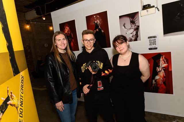 (l-r) Chloe Bradbury, Josephy Frankitt-Kennedy and Reanne Carilsle in front of some of their work at the HIVE exhibition. Photo: Kelvin Stuttard